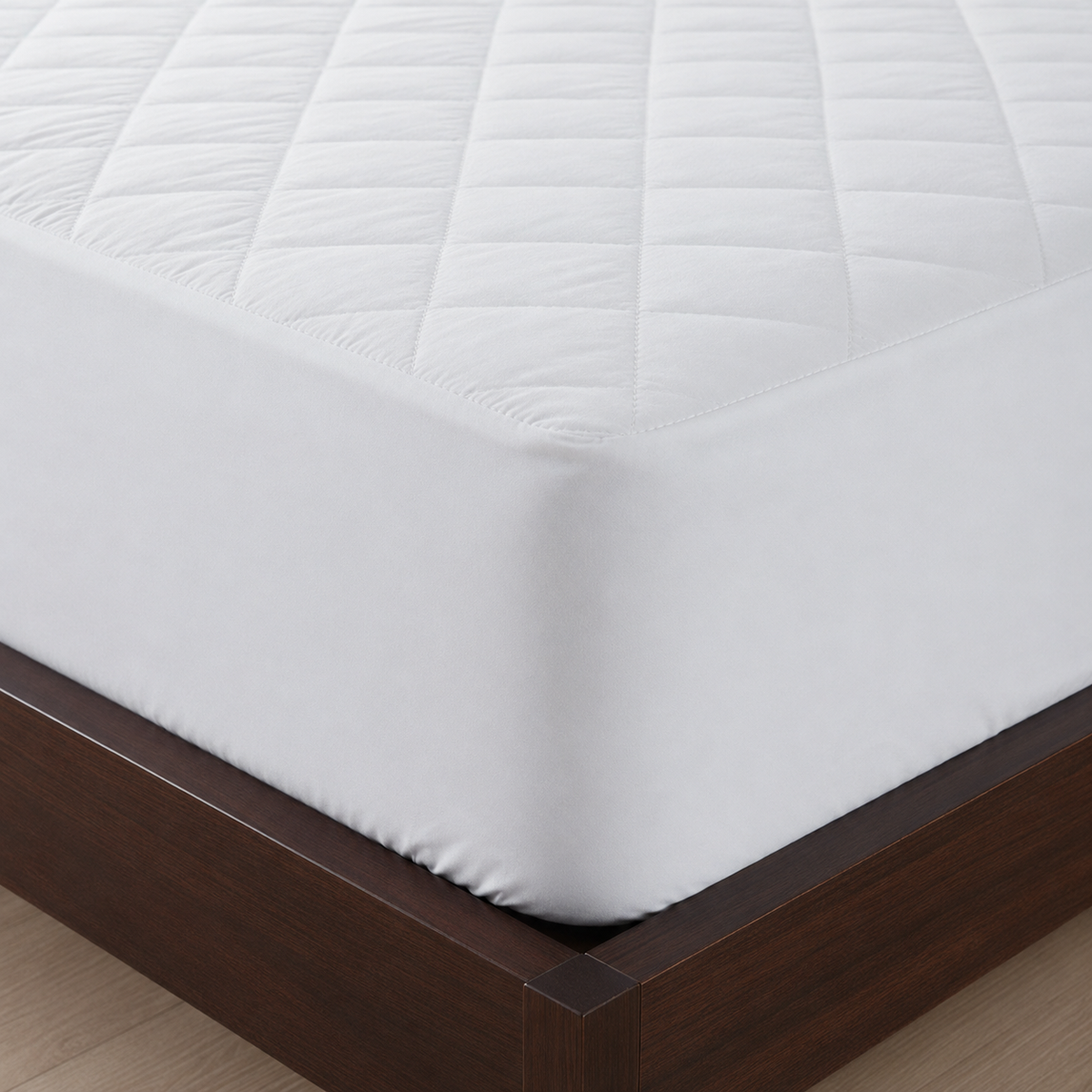 Waterproof quilted mattress protector corner showing 30cm deep fitted skirt