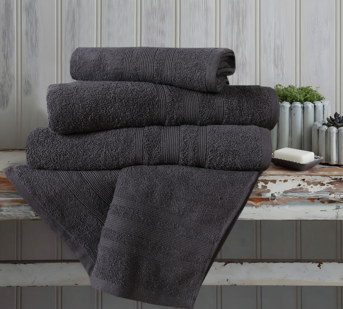 Charcoal cotton towels in bathroom setting