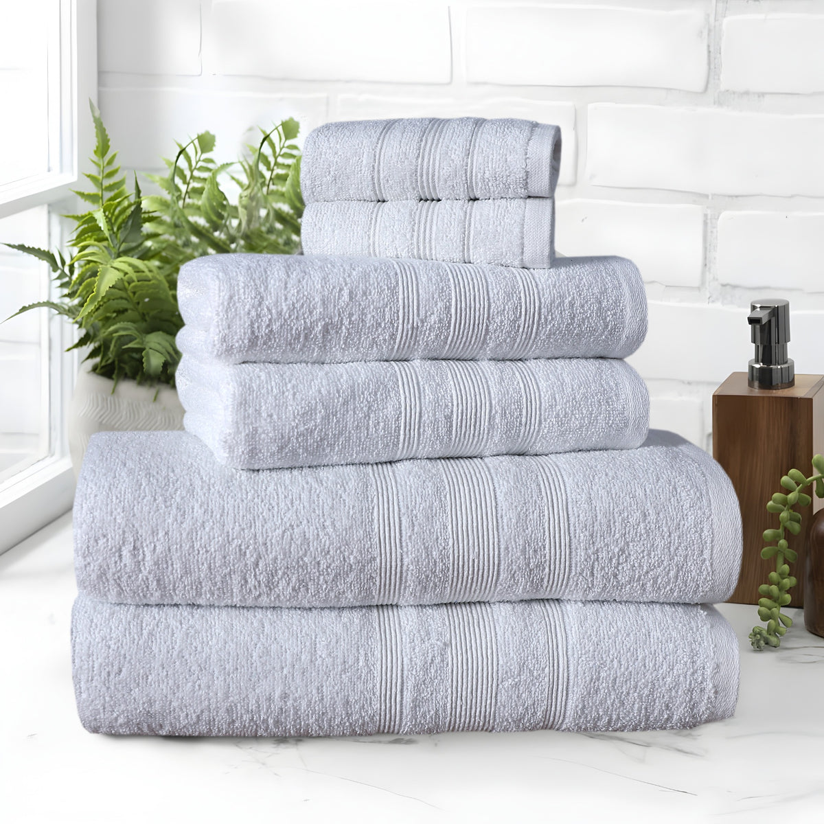 White cotton towels in bathroom setting