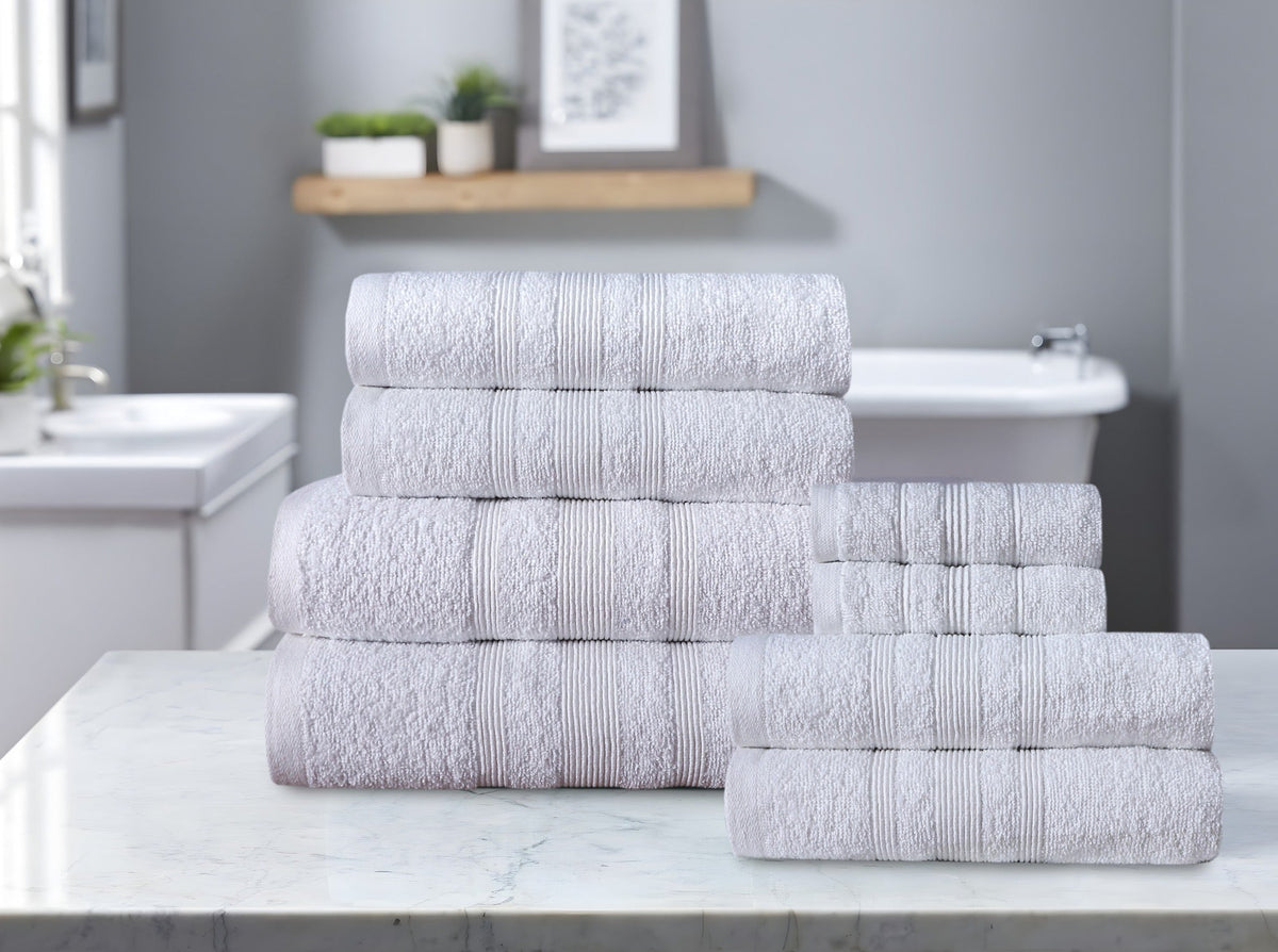 White cotton towel set arranged by size