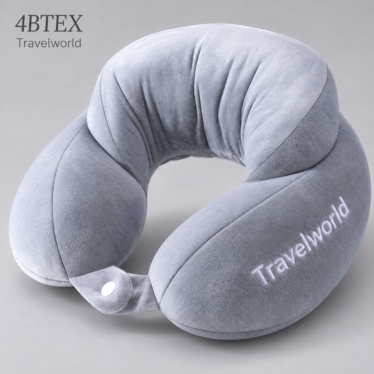 Silver Travelworld U-shaped neck pillow with raised back and front snap fastening — detail view