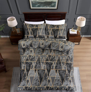 Cosmic grey black and gold geometric bedding overhead view