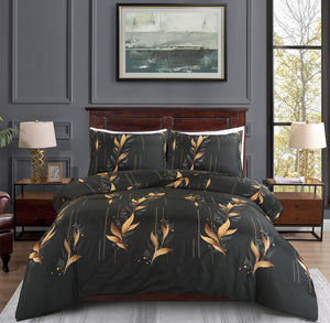 Ember black and gold botanical duvet cover set on bed