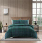Forest Night green tartan check duvet cover set on bed