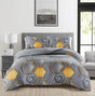 Holies grey and ochre hexagon duvet cover set on bed