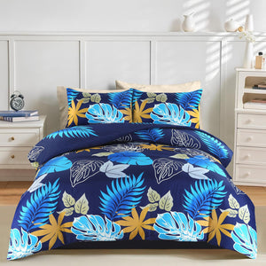 Indigo navy blue tropical leaf duvet cover set on bed
