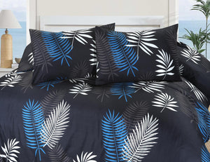 Mystic black blue and white palm leaf bedding close-up
