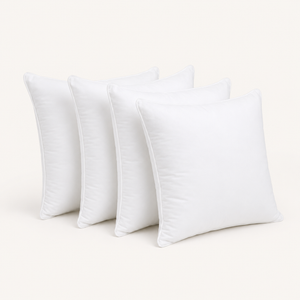 Four premium white cushion inner pads clean studio view