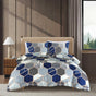 Starlight navy and grey hexagon duvet cover set on bed
